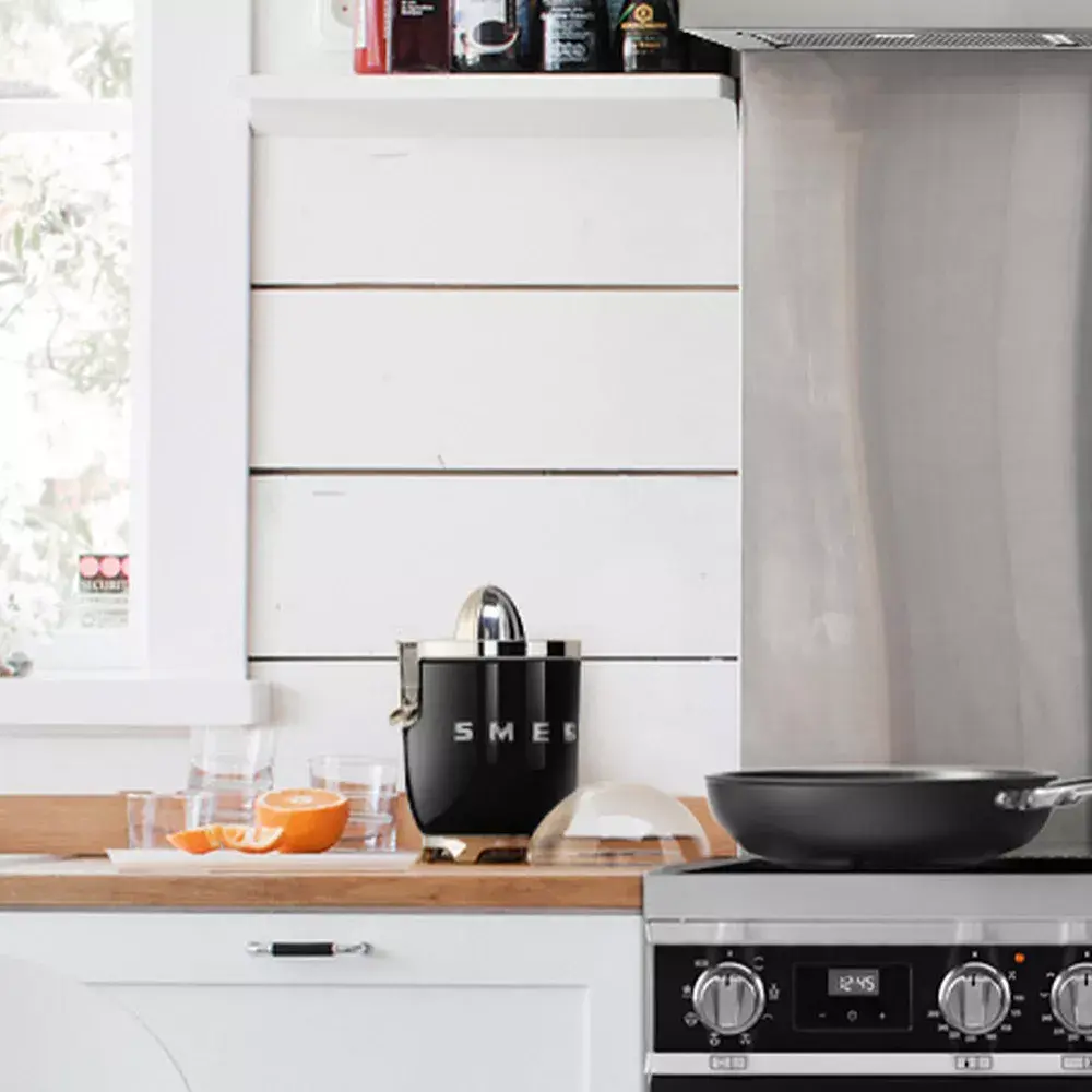 Электрический цитрусовый пресс Smeg CJF11BLEU Photo 5