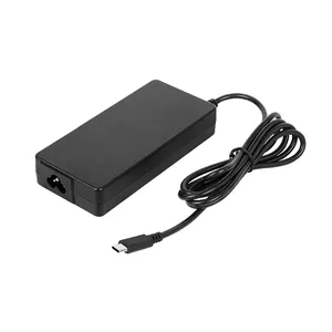 Barošanas adapteris/invertors Getac GAT1E1 — 100 W iekštelpām, ieeja 100–240 V, melns, kabelis 1.8 m, 65×140 mm