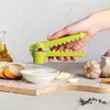 Пресс для чеснока с ручкой Ototo Design Garligator Photo 4