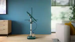 Integrated, multi-angle adjustable ironing board