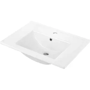 Recessed ceramic washbasin deante CDI_6U6M 60 cm with tap space