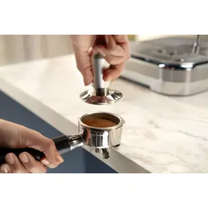 Tamp safely with our countertop-friendly tamping system