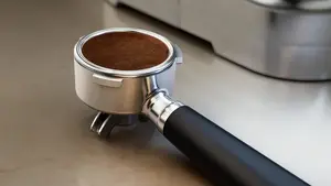 58 mm stainless steel portafilter for a barista-like espresso