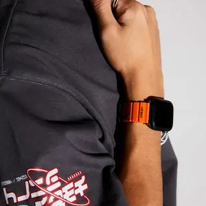 Siksniņa SKINARMA Skinarma Band Shokku priekš Apple Watch 45 mm — oranža