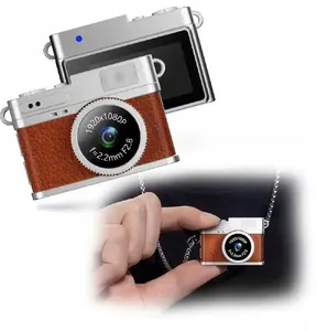 Keychain camera Xrec X4 2MP — compact wearable 2 MP recording device, brown