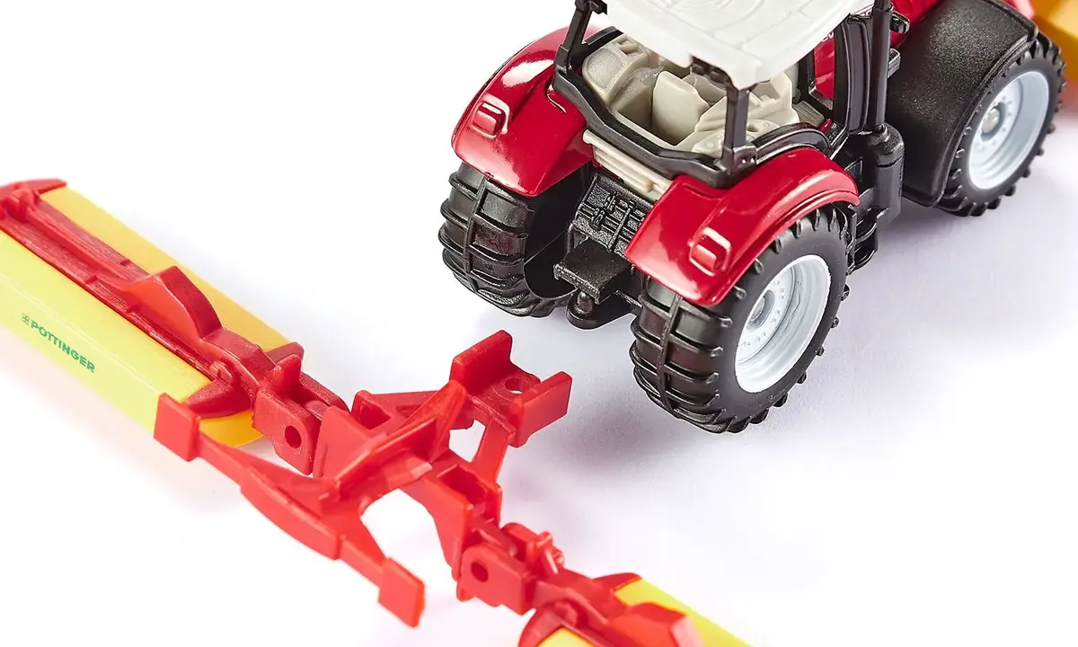Traktors Siku Steyr ar Poettinger pļāvēju Photo 6