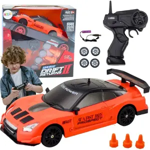 Remote Control Racing Car LEANToys 1:24 scale, orange, interchangeable wheels