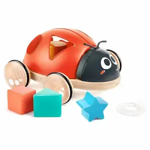 Деревянная сортировочная игрушка Hape Shape-Sorter Ladybug, резина и дерево, от 1 года, чёрно/красно/белая
