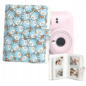 Photo Album LoveInstant for Fujifilm Instax Mini — holds 64 Instax Mini prints, model SB10439, blue penguin cover