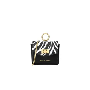 AirPods case bag iDeal of Sweden Ava Mini — Zebra Eclipse, compact protective carry pouch, 84 g
