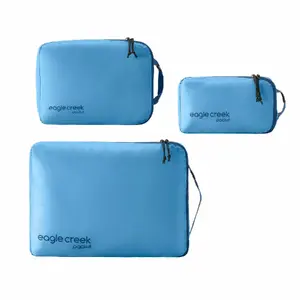 Iešanas kubs Eagle Creek Pack-It Blue Unisex — rāvējslēdzēja aizdare, viendabīgi zils