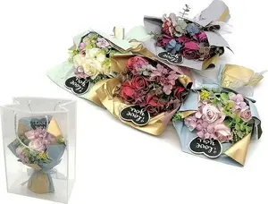 Bouquet of mixed roses in decorative bag, Adar
