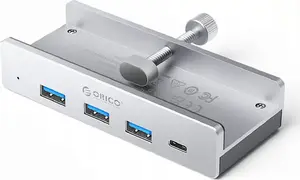 USB‑хаб ORICO с зажимным креплением, вход USB‑C, выходы 3× USB‑A 3.0 + 1× USB‑C 3.0, серебристый