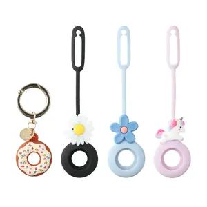 Case for Apple AirTag by 4smarts model 541495 — silicone protective set, 4-pack, colours: Black, Cognac, Light Blue, Rose