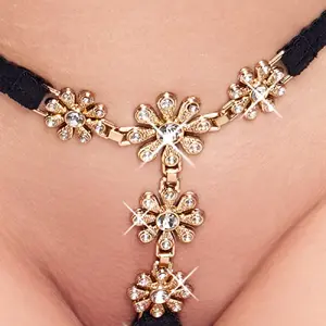 Трусики Cottelli Collection String Flowers S-L — стринги без промежности из эластичных ремешков с цветами и стразами, регулируемый пояс, 90% полиамид 10% эластан
