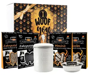 QCHEFS Glückskiste Set Hund — gift set for dog dental care with a bowl and a metal tin