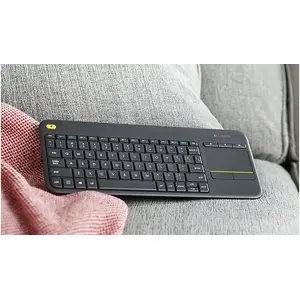 Integrēta bezvadu tastatūra ar skārienplati