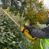 Power hedge trimmer DeWALT DCM563P1-QW Photo 4
