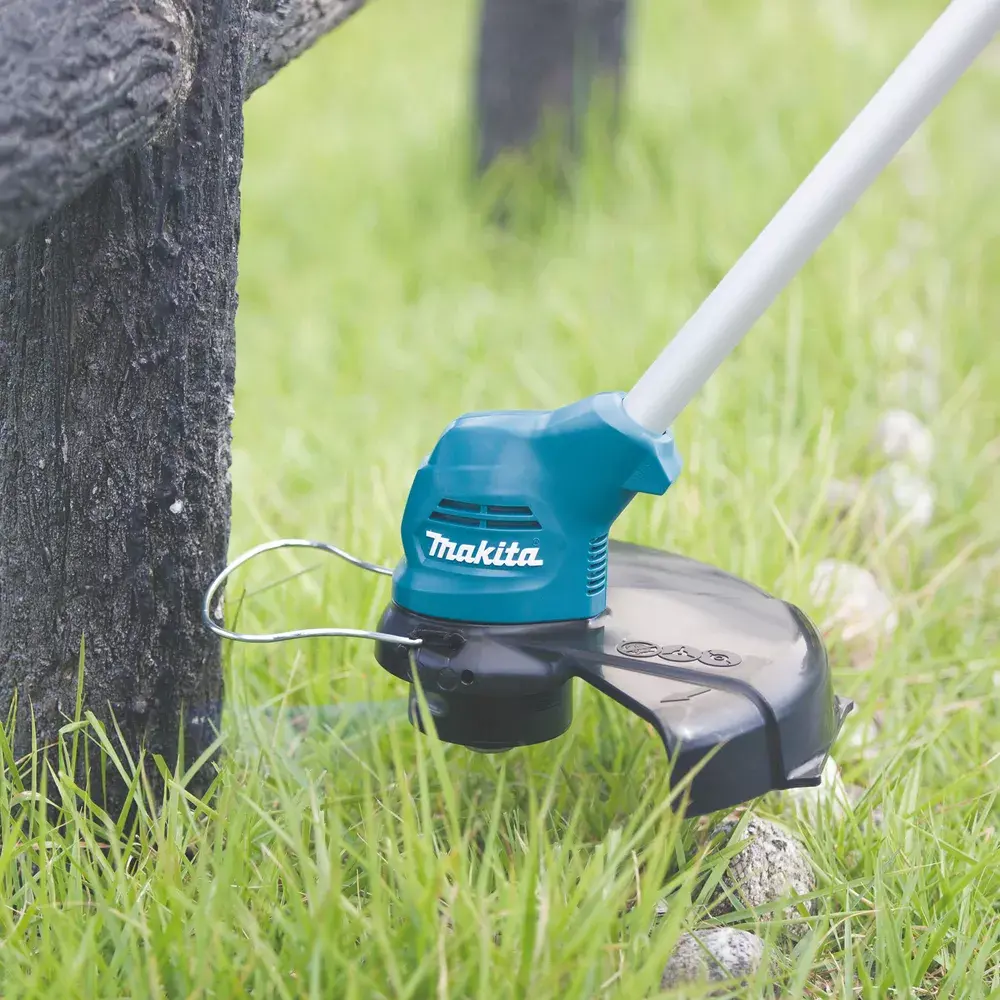 Триммер Makita UR100DSME Photo 3
