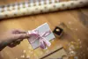 Brother TZE-RE34 Label Tape Gold on Pink Photo 4