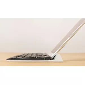 Integrated rubber cradle holds mobile devices