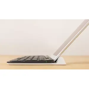 Integrated rubber cradle holds mobile devices