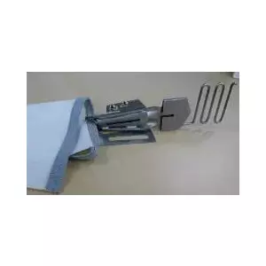Accessory Brother SA231CV for CV3440 & CV3550 flatlock machines — slanted thread tape attachment for seams