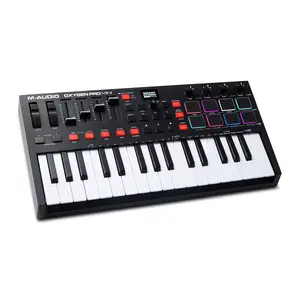 MIDI keyboard M-Audio Oxygen Pro Mini — 32-key USB controller, RGB backlight, OLED display, 8 pads, 4 faders, 4 encoders