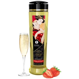 Masāžas eļļa Shunga 240 ml — Barojoša un mīkstinoša, vegāniska, auksti spiestas eļļas, E vitamīns, zemeņu/šampanieša aromāts