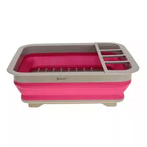 Folded drying rack and of cutlery. Made of plastic and silicone.Coror pink